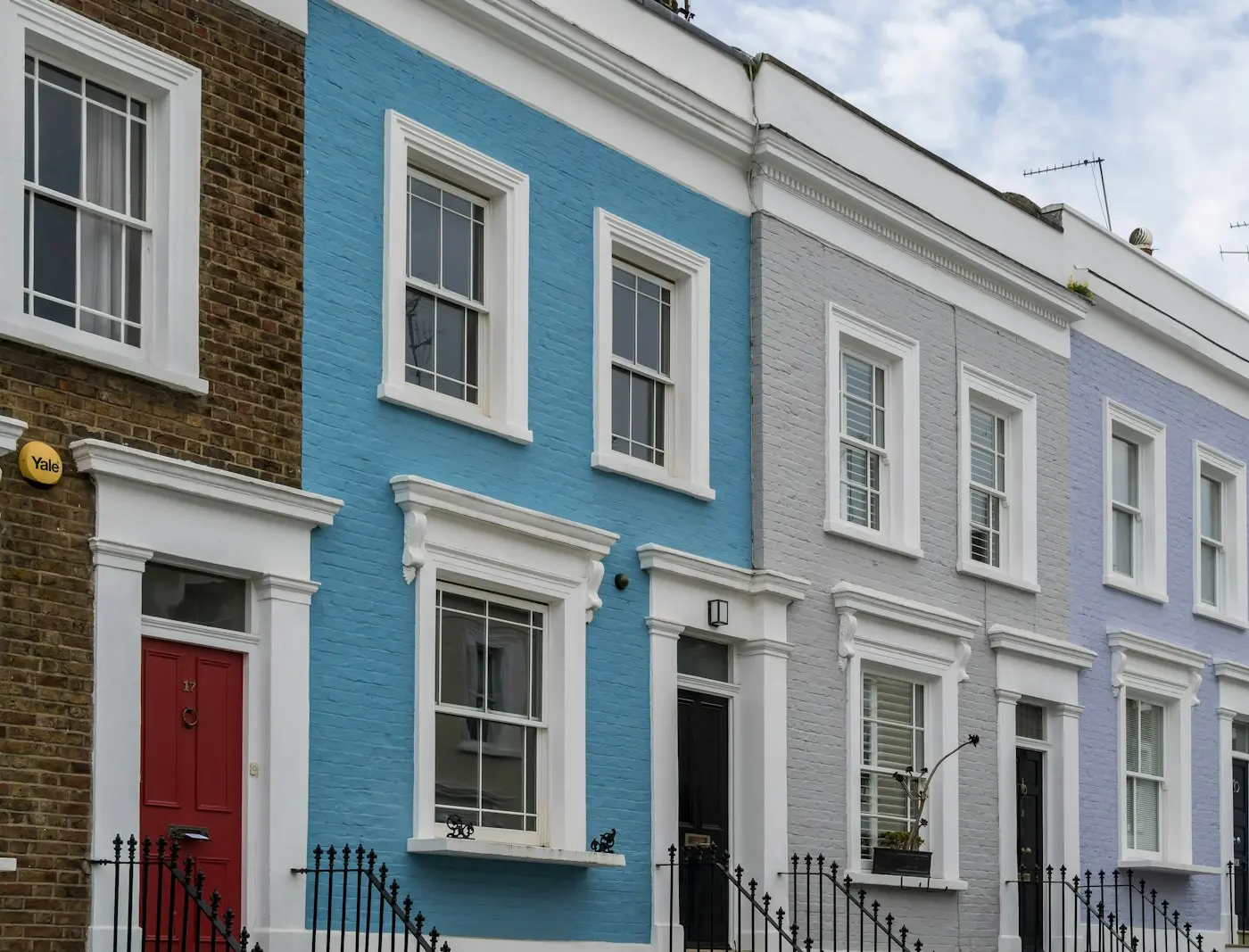 Coloured terrace houses on a quiet street