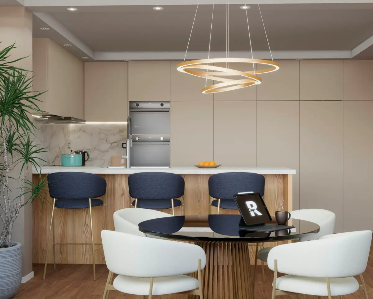 A modern open kitchen with a dining table